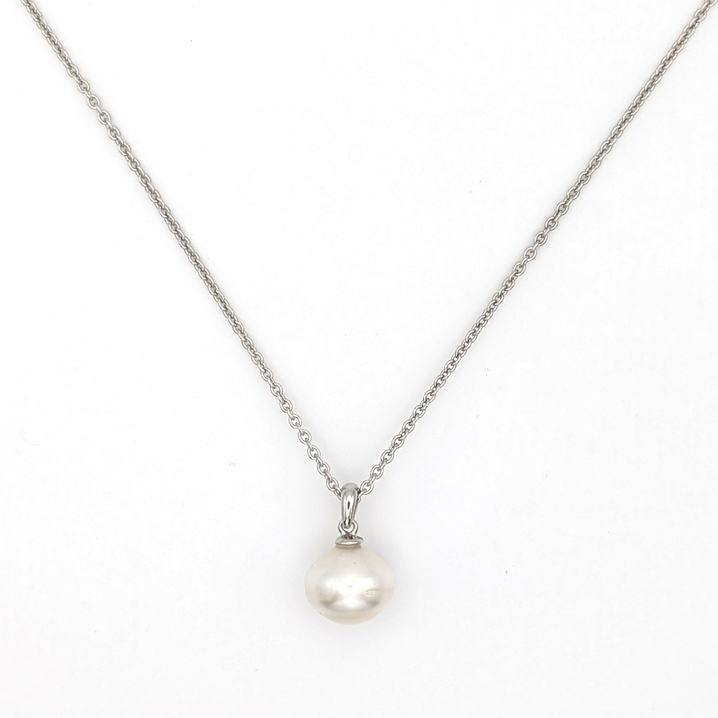 South sea pearl pendant necklace with rhodium plated chain on a white background