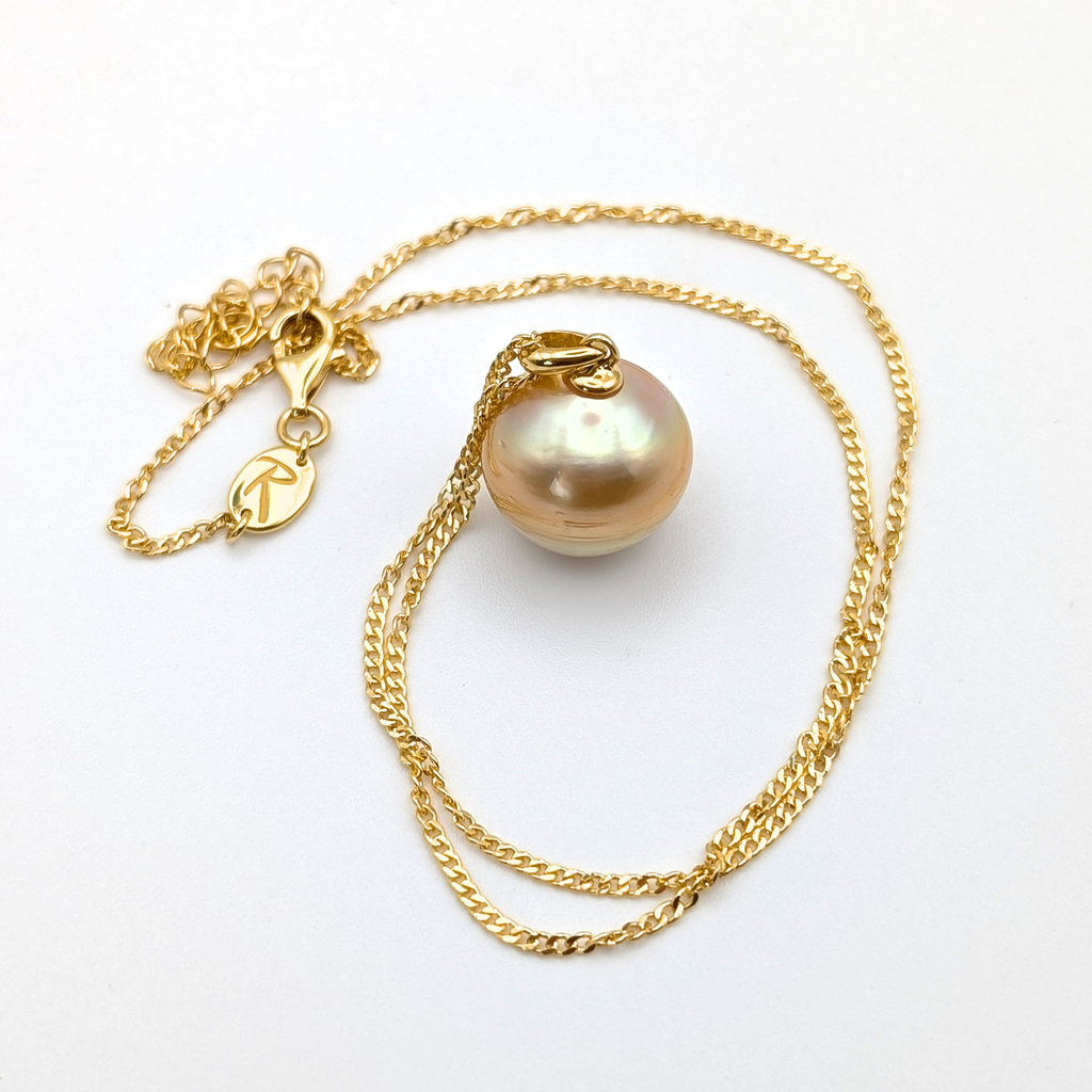 Gold vermeil necklace with an extra large south sea pearl pendant on a white background