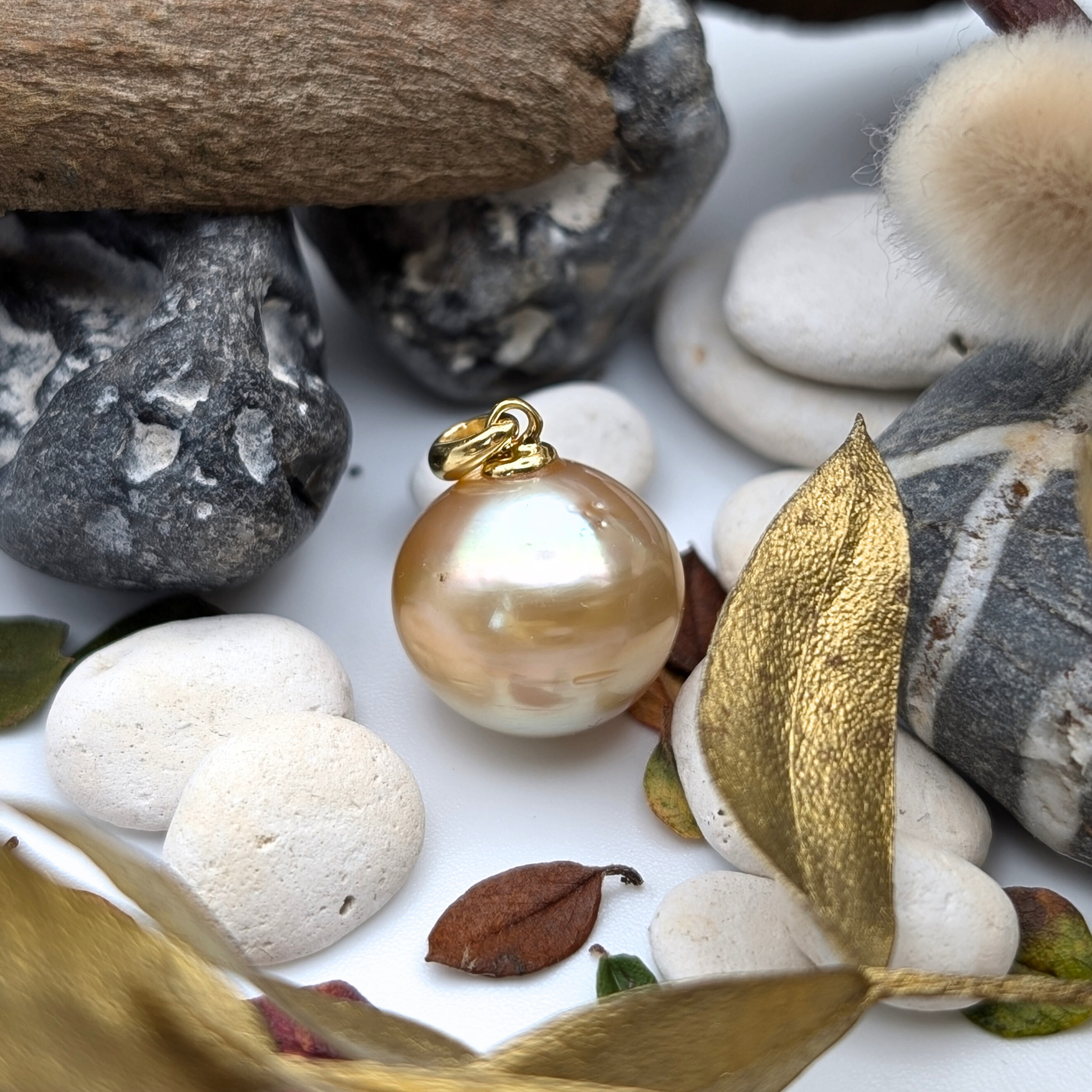 Gold vermeil necklace with an extra large south sea pearl pendant  lifestyle image