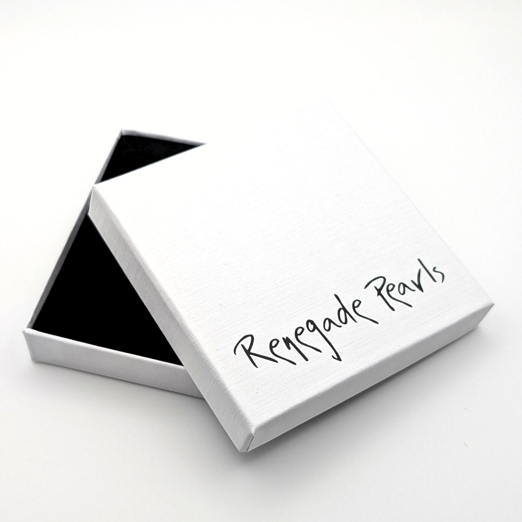 open box with  Renegade pearls branding, packaging for south sea pearl pendant necklace, on white background