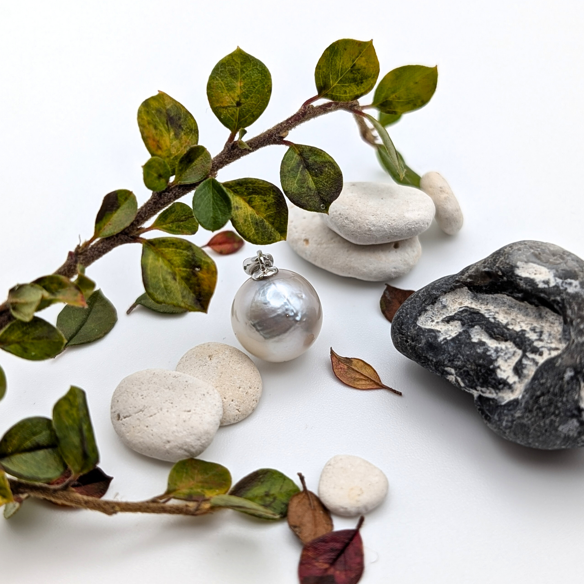 Silver south sea pearl pendant necklace with rhodium plated silver chain with lifestyle background