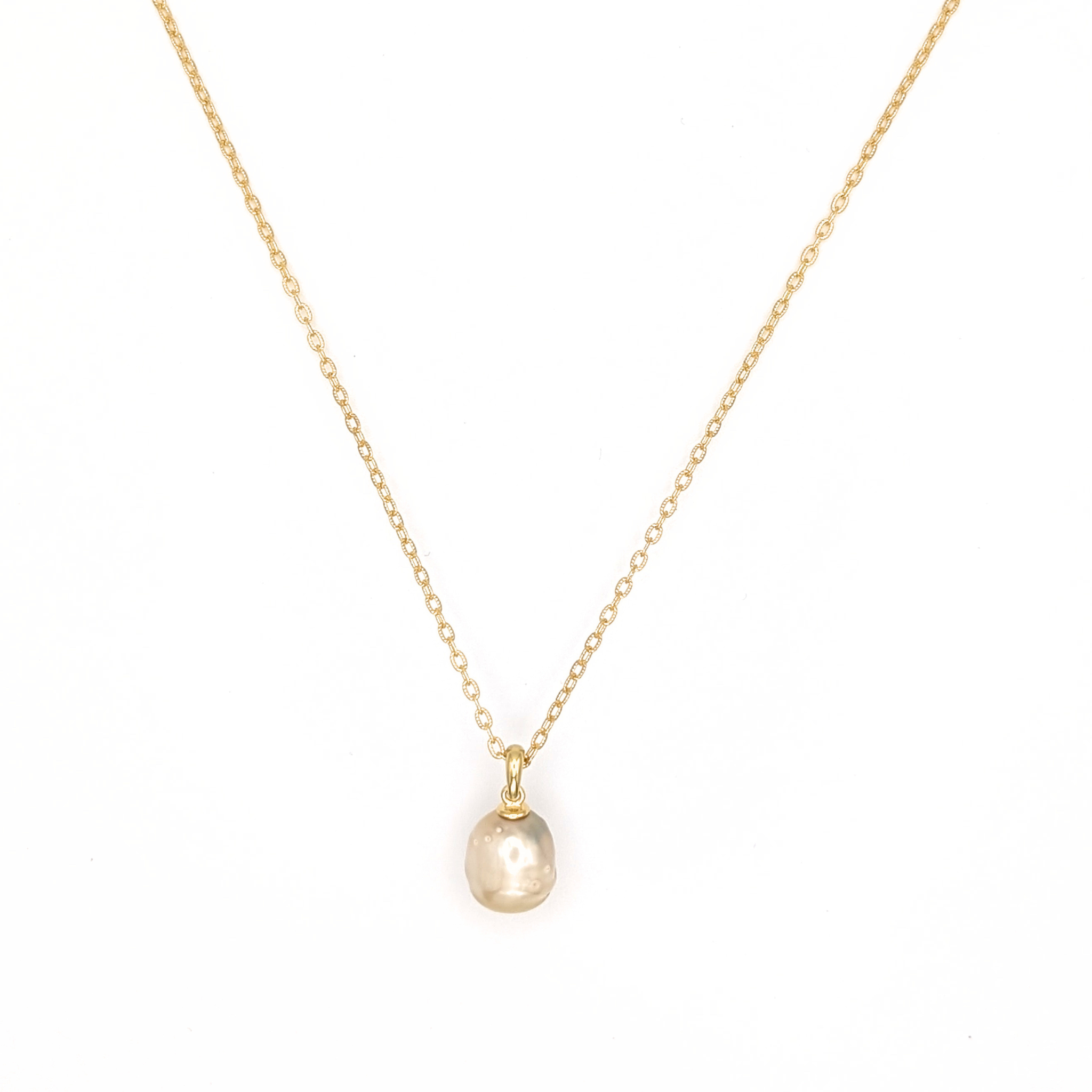 Gold vermeil pendant necklace with a gold spotted south sea pearl pendant on a white background