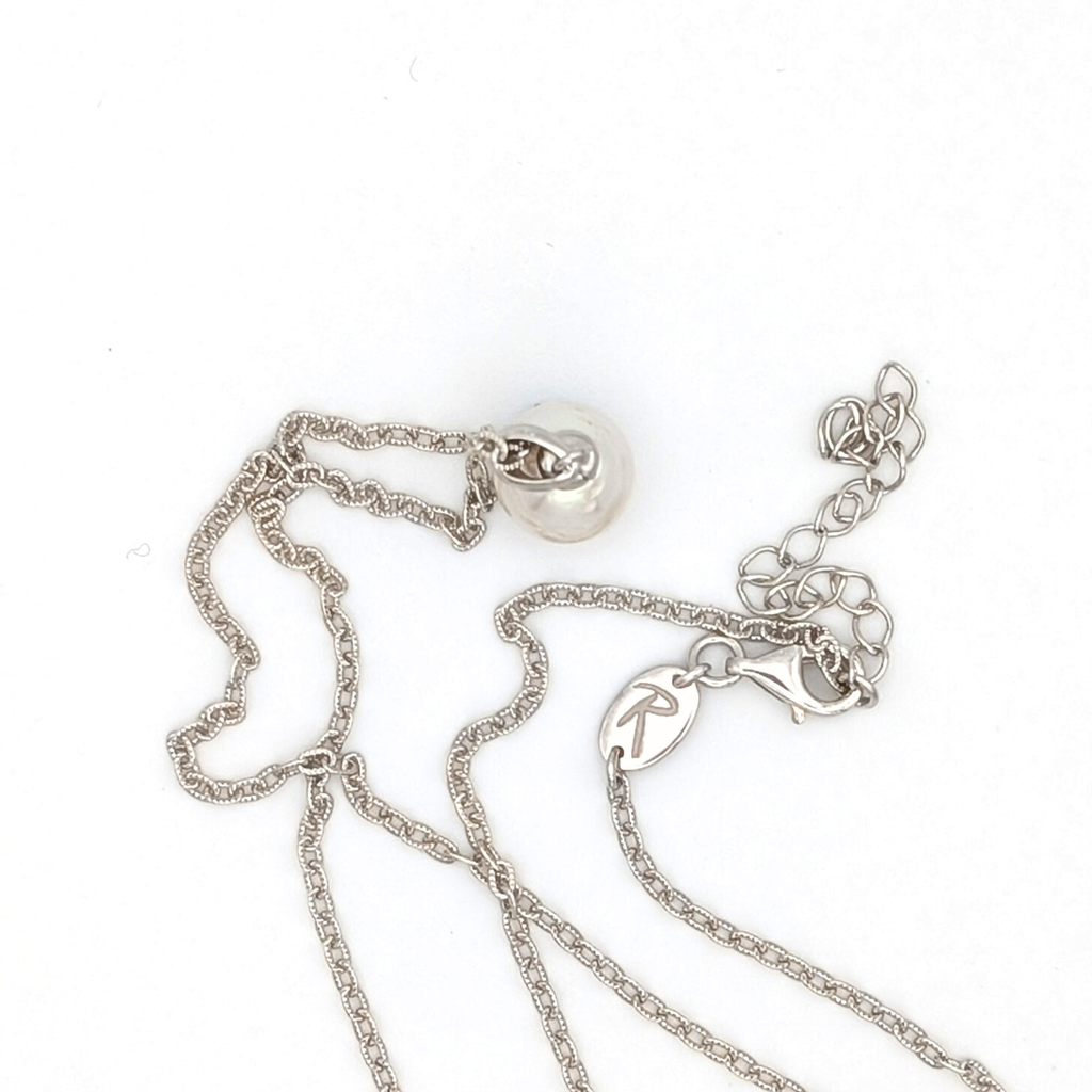 Striped medium silver white south sea pearl with three spots pendant necklace with rhodium plated sterling silver chain on white background