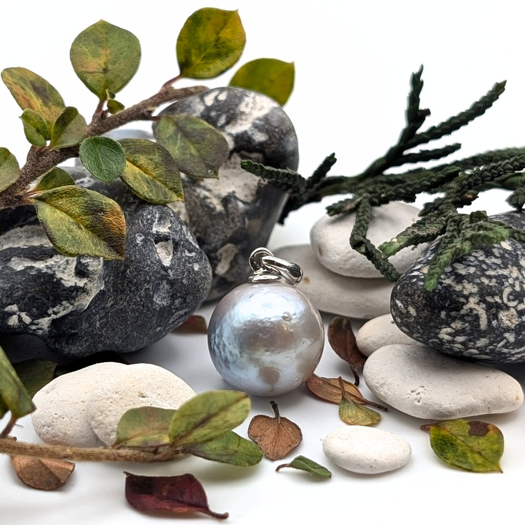 blue silver south sea pearl pendant with rhodium plated sterling silver bail with pebbled and ever greens