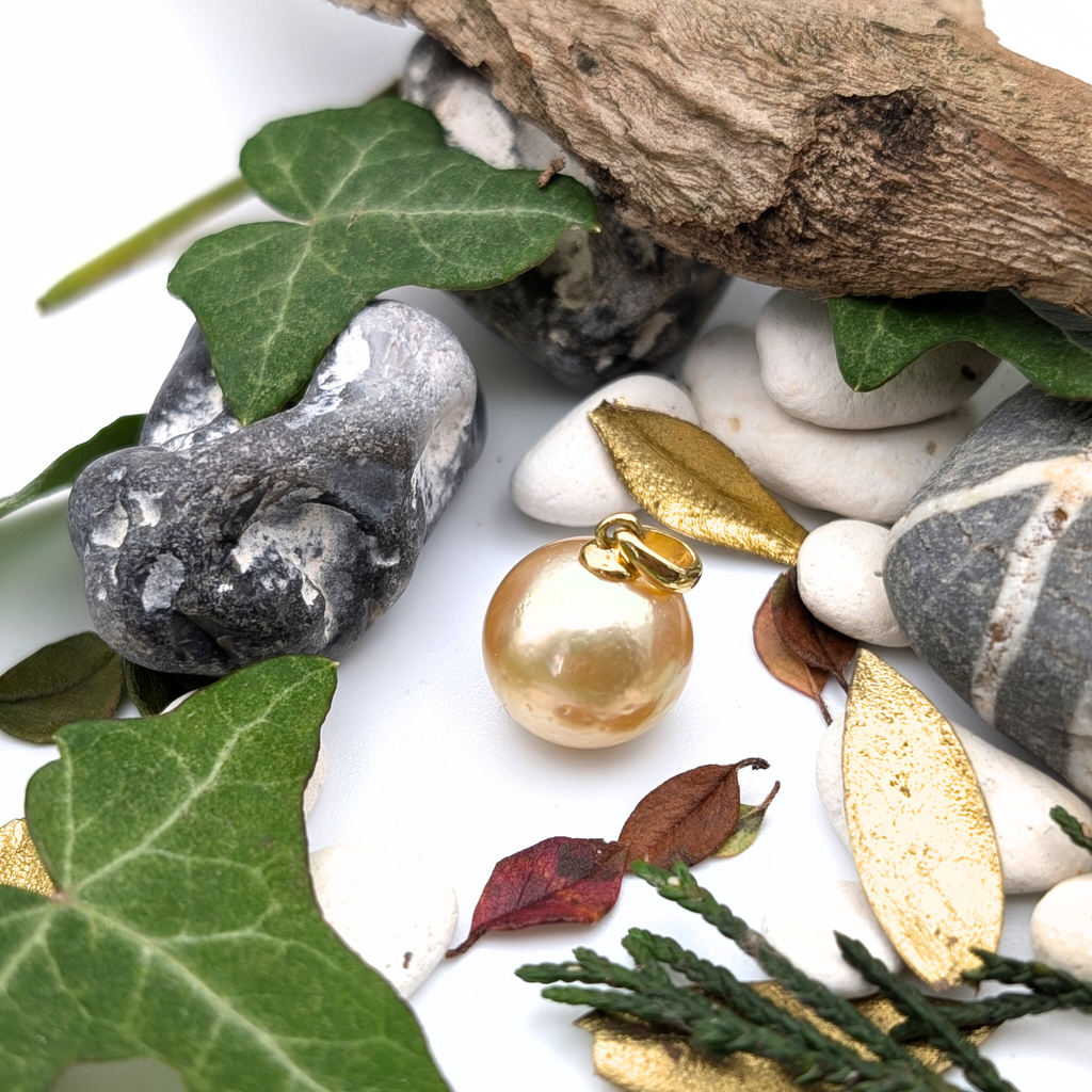 coppery gold south sea pearl pendant necklace with gold vermeil bail and chain  woodland background