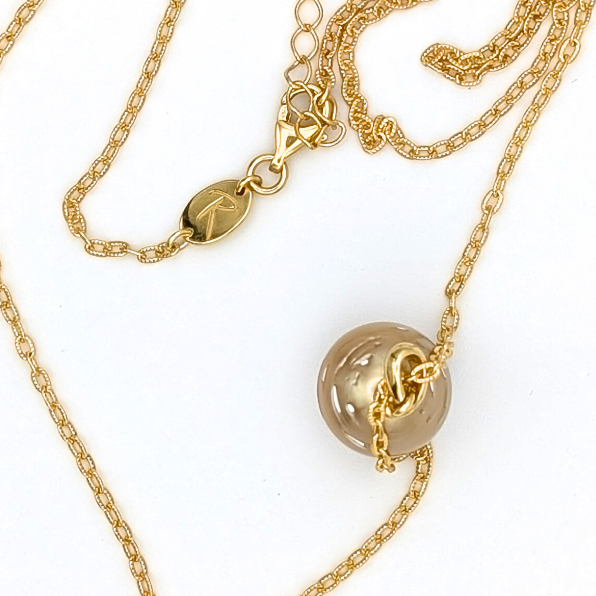 deep contour gold south sea pearl pendant necklace with gold vermeil chain on white background