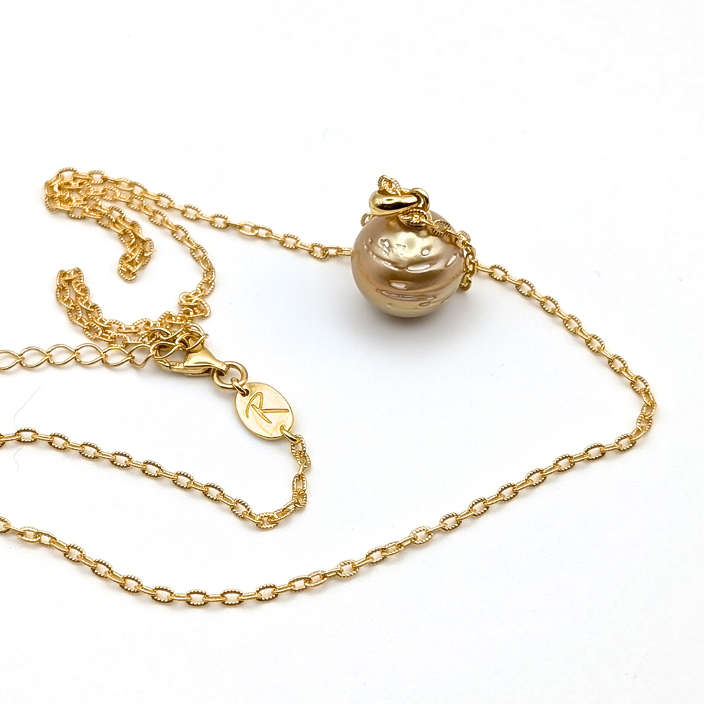 deep contour gold south sea pearl pendant necklace with gold vermeil chain on white background