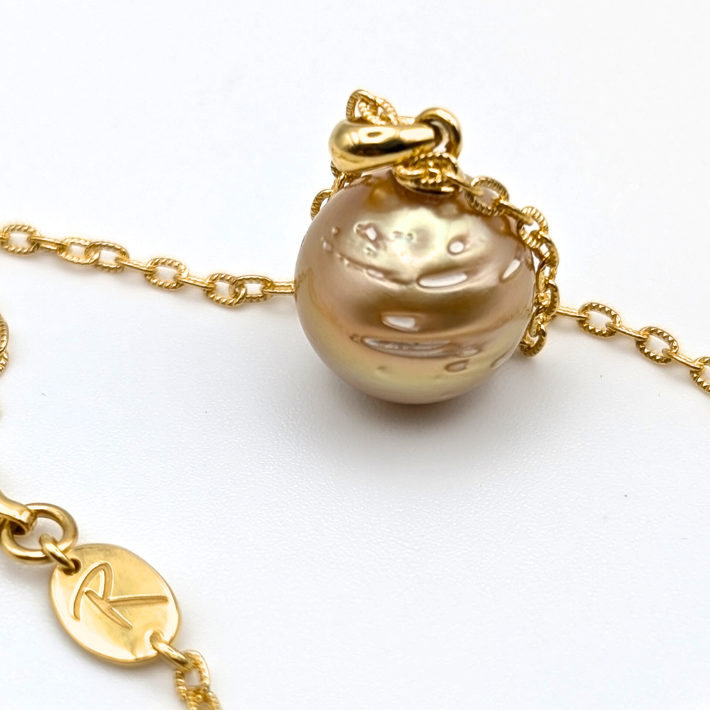 deep contour gold south sea pearl pendant necklace with gold vermeil chain on white background