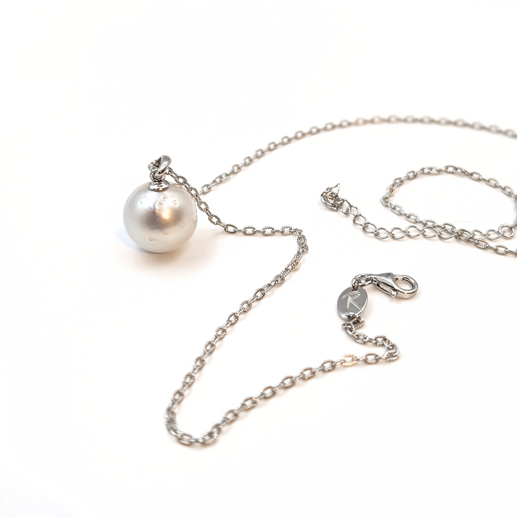 extra large silver south sea pearl with three spots pendant necklace with rhodium plated sterling silver chain on white background