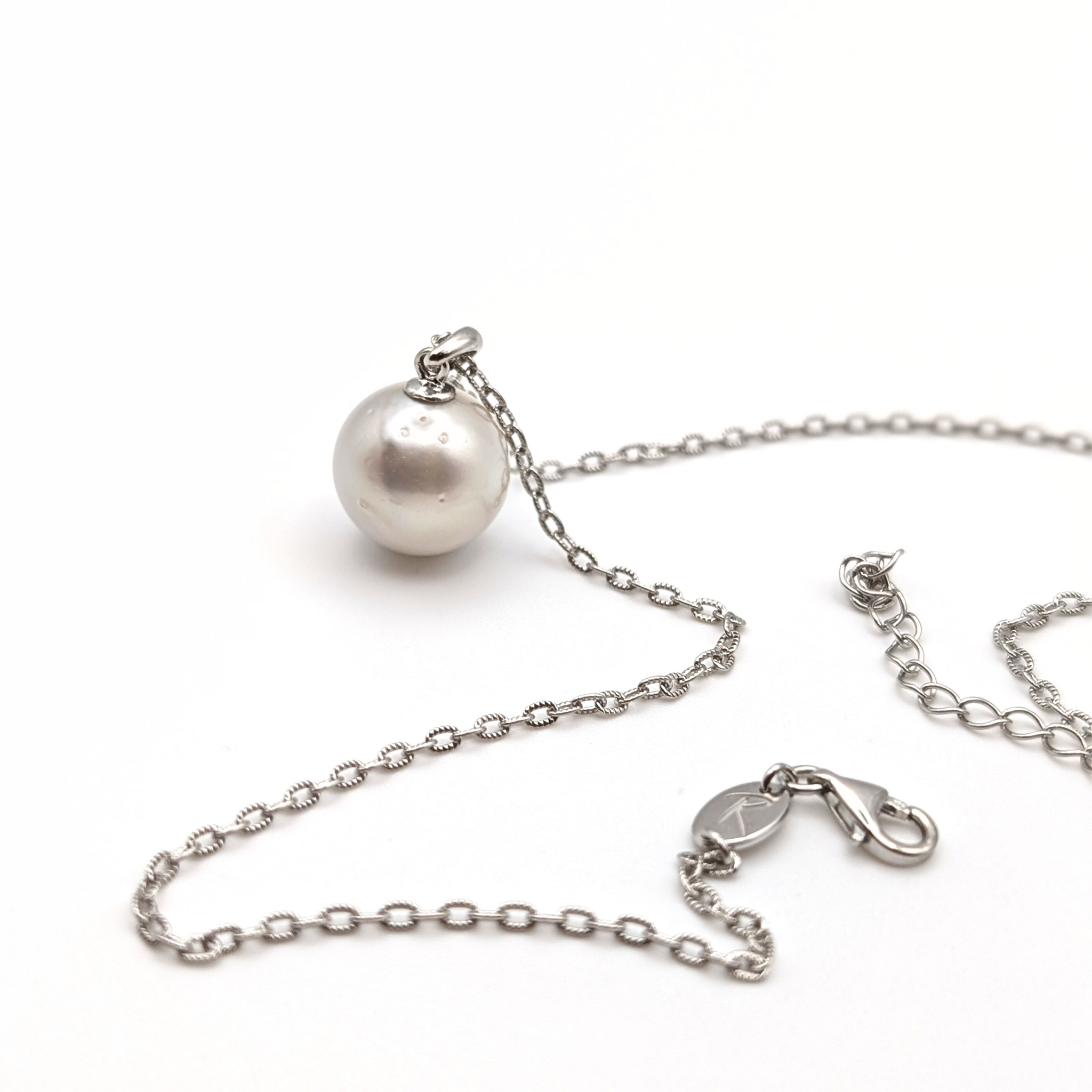 extra large silver south sea pearl with three spots pendant necklace with rhodium plated sterling silver chain on white background