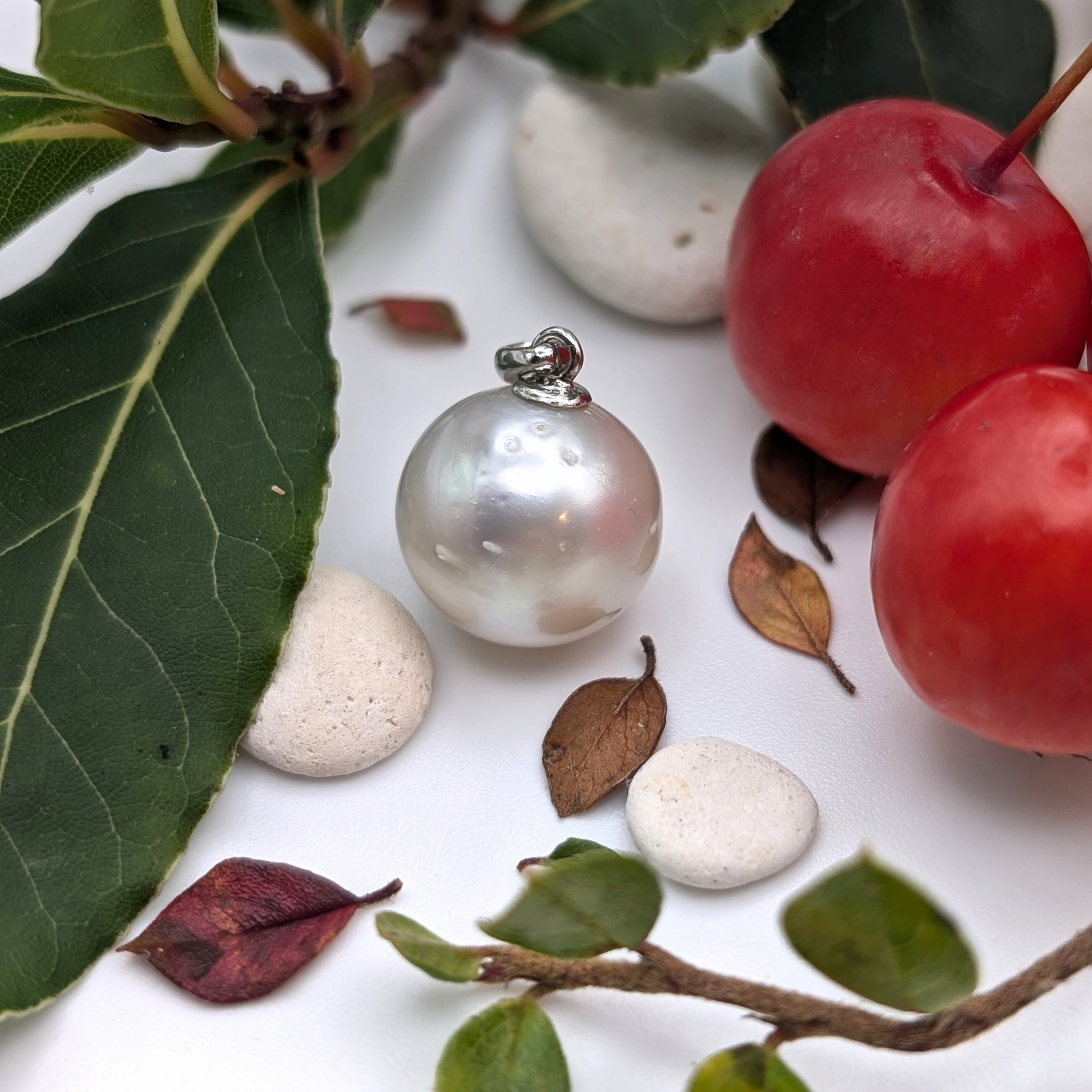 extra large silver south sea pearl with three spots pendant necklace with rhodium plated sterling silver chain with lifestyle background