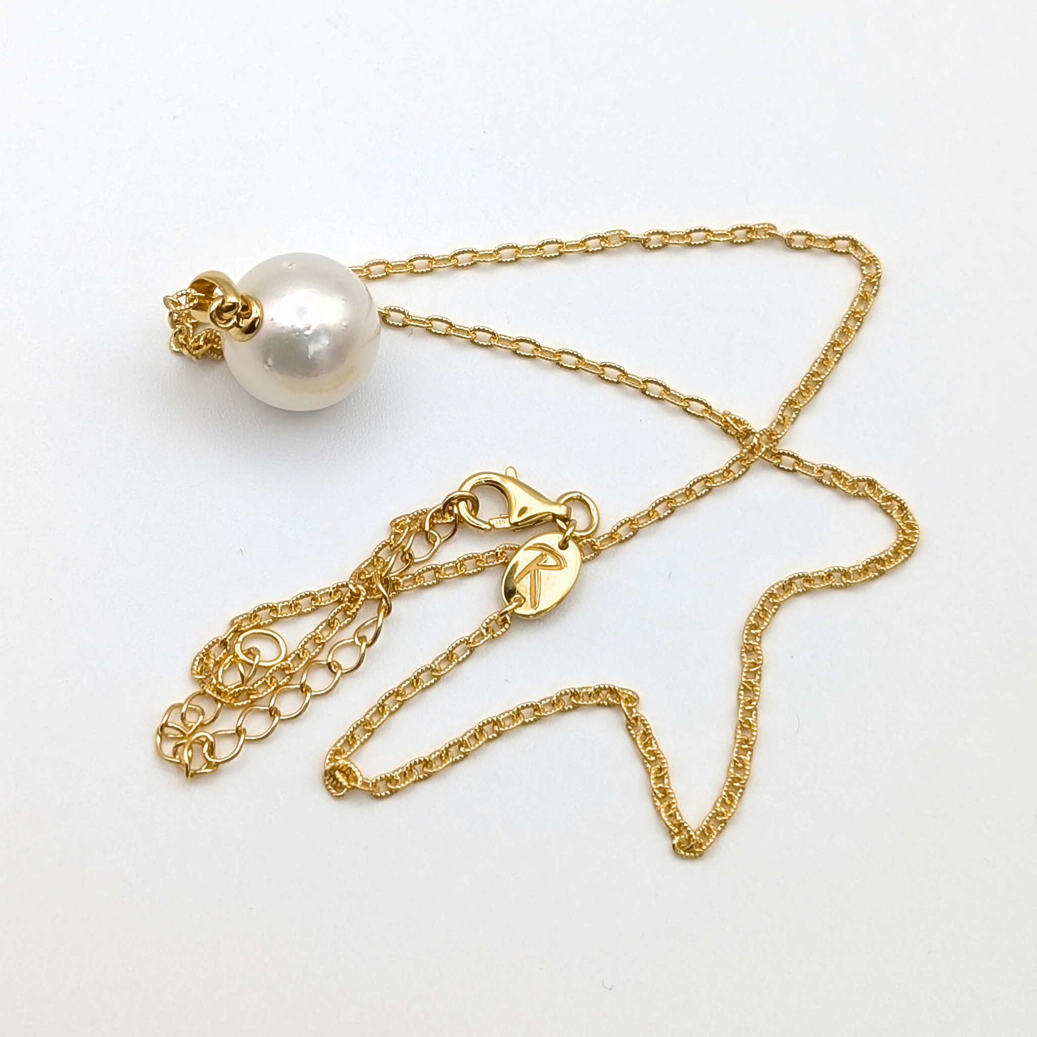 white  south sea pearl pendant necklace with gold vermeil bail and chain on white background